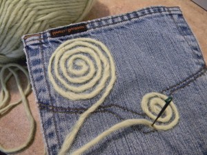 Felting recyceld jean pockets for hanging accessory organizer