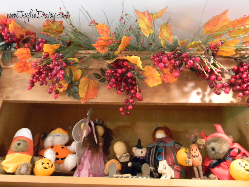 Halloween decorations above sink cupboard